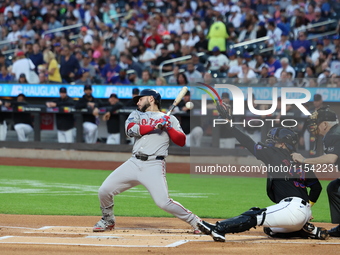 Boston Red Sox player Wilyer Abreu #52 gets out of the way of a pitch during the first inning of the baseball game against the New York Mets...