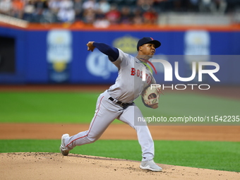 Boston Red Sox pitcher Brayan Bello #66 throws during the second inning of the baseball game against the New York Mets at Citi Field in Coro...