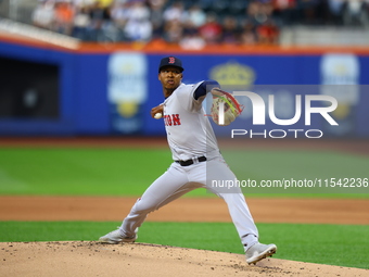 Boston Red Sox pitcher Brayan Bello #66 throws during the second inning of the baseball game against the New York Mets at Citi Field in Coro...