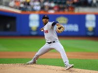 Boston Red Sox pitcher Brayan Bello #66 throws during the second inning of the baseball game against the New York Mets at Citi Field in Coro...