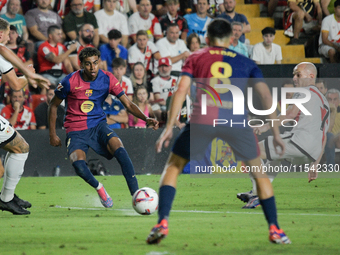 Lamine Yamal of Barcelona is in action during the La Liga match between Rayo Vallecano and FC Barcelona at Estadio de Vallecas in Madrid, Sp...