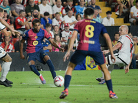 Lamine Yamal of Barcelona is in action during the La Liga match between Rayo Vallecano and FC Barcelona at Estadio de Vallecas in Madrid, Sp...