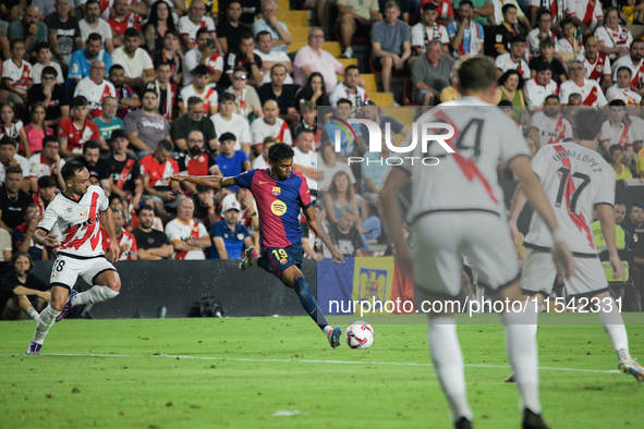 Lamine Yamal of Barcelona is in action during the La Liga match between Rayo Vallecano and FC Barcelona at Estadio de Vallecas in Madrid, Sp...