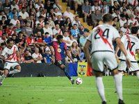 Lamine Yamal of Barcelona is in action during the La Liga match between Rayo Vallecano and FC Barcelona at Estadio de Vallecas in Madrid, Sp...