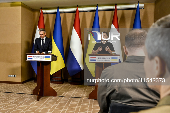 President of Ukraine Volodymyr Zelenskyy (R) and Prime Minister of the Netherlands Dick Schoof are pictured during a joint press conference...