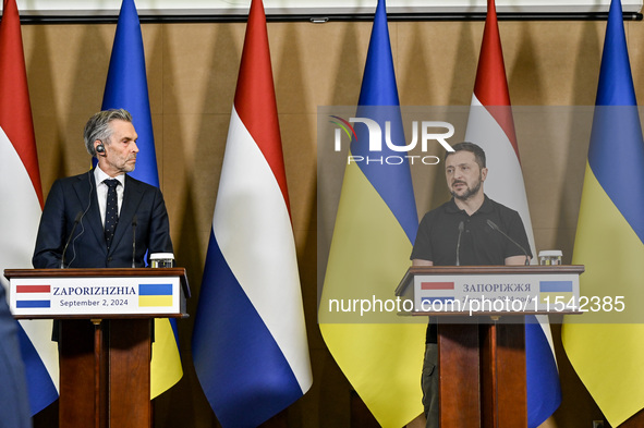 President of Ukraine Volodymyr Zelenskyy (R) and Prime Minister of the Netherlands Dick Schoof are pictured during a joint press conference...