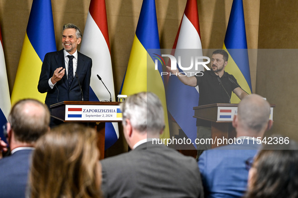 President of Ukraine Volodymyr Zelenskyy (R) and Prime Minister of the Netherlands Dick Schoof are pictured during a joint press conference...