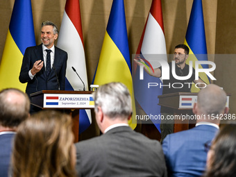 President of Ukraine Volodymyr Zelenskyy (R) and Prime Minister of the Netherlands Dick Schoof are pictured during a joint press conference...