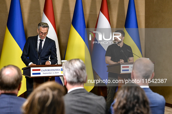 President of Ukraine Volodymyr Zelenskyy (R) and Prime Minister of the Netherlands Dick Schoof are pictured during a joint press conference...