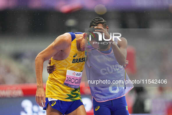 Yeltsin Jacques of Brazil celebrates winning gold in Men's 1500m - T11 Final during the Paris 2024 Paralympic Games at Stade de France on Se...