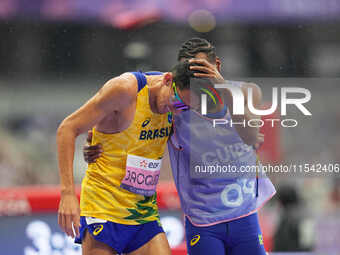 Yeltsin Jacques of Brazil celebrates winning gold in Men's 1500m - T11 Final during the Paris 2024 Paralympic Games at Stade de France on Se...