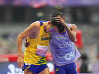 Yeltsin Jacques of Brazil celebrates winning gold in Men's 1500m - T11 Final during the Paris 2024 Paralympic Games at Stade de France on Se...