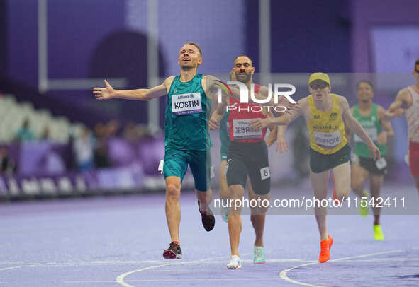 Anton Kuliatin of Neutral Paralympic Athletes celebrates winning gold in Men's 1500m - T12 Final during the Paris 2024 Paralympic Games at S...