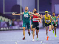 Anton Kuliatin of Neutral Paralympic Athletes celebrates winning gold in Men's 1500m - T12 Final during the Paris 2024 Paralympic Games at S...