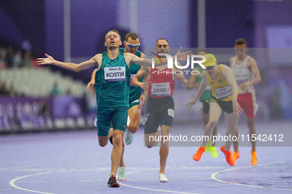 Anton Kuliatin of Neutral Paralympic Athletes celebrates winning gold in Men's 1500m - T12 Final during the Paris 2024 Paralympic Games at S...