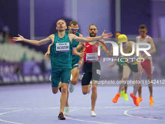 Anton Kuliatin of Neutral Paralympic Athletes celebrates winning gold in Men's 1500m - T12 Final during the Paris 2024 Paralympic Games at S...