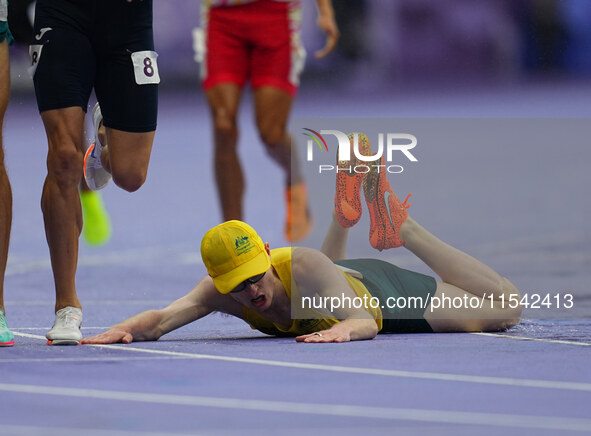 Jaryd Clifford of Australia on the ground in Men's 1500m - T12 Final during the Paris 2024 Paralympic Games at Stade de France on September...