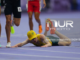 Jaryd Clifford of Australia on the ground in Men's 1500m - T12 Final during the Paris 2024 Paralympic Games at Stade de France on September...