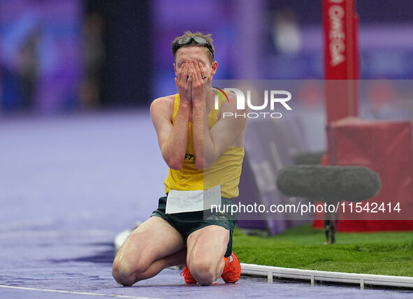 Jaryd Clifford of Australia on the ground in Men's 1500m - T12 Final during the Paris 2024 Paralympic Games at Stade de France on September...