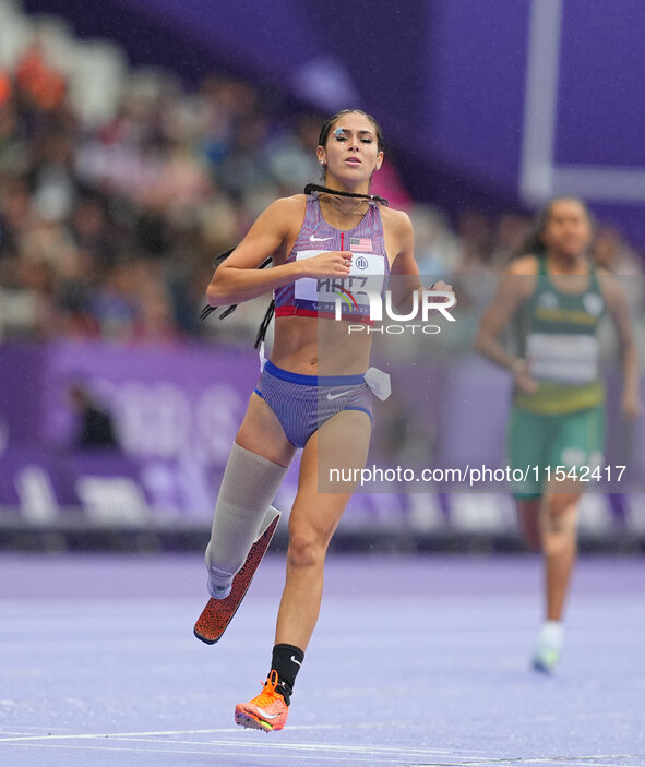 B Hatz of United States of America in action in Women's 200m - T64 Round 1 during the Paris 2024 Paralympic Games at Stade de France on Sept...