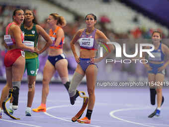 B Hatz of United States of America in action in Women's 200m - T64 Round 1 during the Paris 2024 Paralympic Games at Stade de France on Sept...