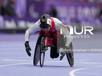 Cody Fournie of Canada celebrates winning gold in Men's 200m - T51 Final during the Paris 2024 Paralympic Games at Stade de France on Septem...