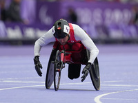 Cody Fournie of Canada celebrates winning gold in Men's 200m - T51 Final during the Paris 2024 Paralympic Games at Stade de France on Septem...