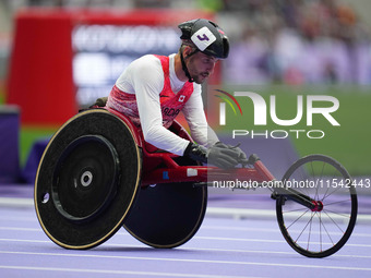 Cody Fournie of Canada celebrates winning gold in Men's 200m - T51 Final during the Paris 2024 Paralympic Games at Stade de France on Septem...