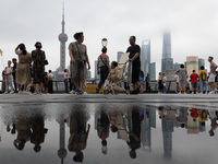 Tourists visit the Bund view platform in Shanghai, China, on September 3, 2024. (