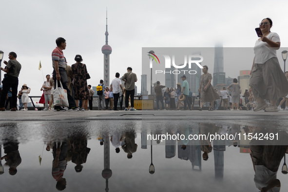 Tourists visit the Bund view platform in Shanghai, China, on September 3, 2024. 