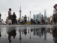 Tourists visit the Bund view platform in Shanghai, China, on September 3, 2024. (