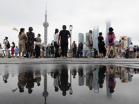 Tourists visit the Bund view platform in Shanghai, China, on September 3, 2024. (