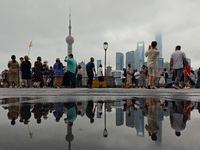 Tourists visit the Bund view platform in Shanghai, China, on September 3, 2024. (