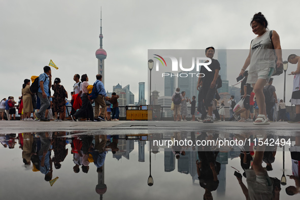 Tourists visit the Bund view platform in Shanghai, China, on September 3, 2024. 