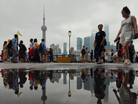 Tourists visit the Bund view platform in Shanghai, China, on September 3, 2024. (