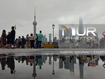 Tourists visit the Bund view platform in Shanghai, China, on September 3, 2024. (