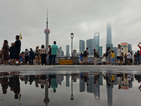 Tourists visit the Bund view platform in Shanghai, China, on September 3, 2024. (