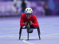 Catherine Debrunner of Switzerland celebrates winning gold in Women's 1500m - T54 Final during the Paris 2024 Paralympic Games at Stade de F...