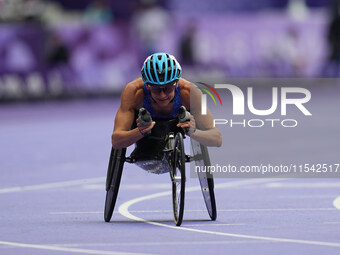 Susannah Scaroni of United States of America celebrates winning bronze in Women's 1500m - T54 Final during the Paris 2024 Paralympic Games a...