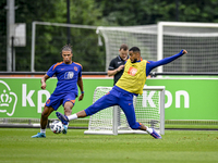 Netherlands player Nathan Ake and Netherlands player Cody Gakpo during the training and press conference for the Netherlands Nations League...