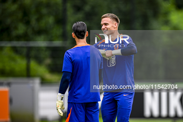 Netherlands goalkeeper Nick Olij and Netherlands goalkeeper Mark Flekken during the training and press conference for the Netherlands Nation...