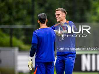 Netherlands goalkeeper Nick Olij and Netherlands goalkeeper Mark Flekken during the training and press conference for the Netherlands Nation...