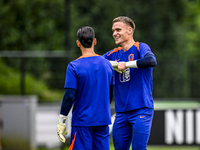 Netherlands goalkeeper Nick Olij and Netherlands goalkeeper Mark Flekken during the training and press conference for the Netherlands Nation...