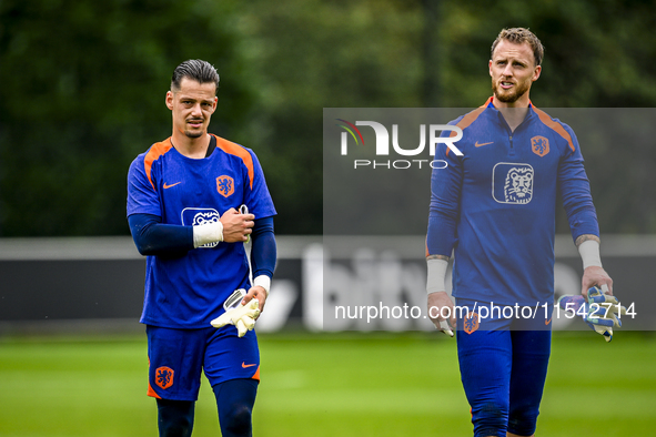 Netherlands goalkeeper Nick Olij and Netherlands goalkeeper Mark Flekken during the training and press conference for the Netherlands Nation...