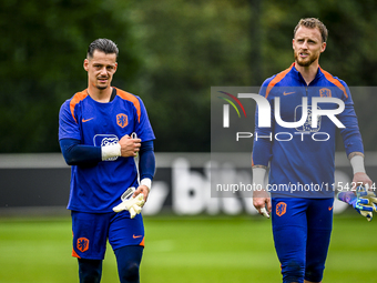 Netherlands goalkeeper Nick Olij and Netherlands goalkeeper Mark Flekken during the training and press conference for the Netherlands Nation...