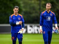 Netherlands goalkeeper Nick Olij and Netherlands goalkeeper Mark Flekken during the training and press conference for the Netherlands Nation...