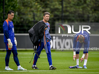 Netherlands goalkeeper Nick Olij and Netherlands goalkeeper trainer Patrick Lodewijks during the training and press conference for the Nethe...