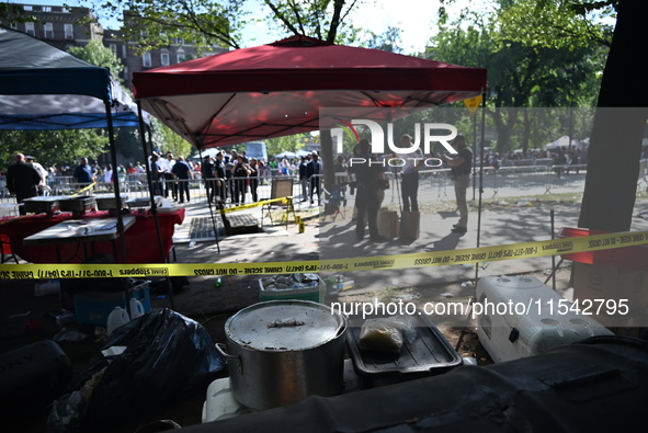 View of the crime scene with evidence markers placed on the ground. The NYPD says in an update that one person is killed and four other peop...