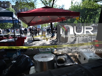 View of the crime scene with evidence markers placed on the ground. The NYPD says in an update that one person is killed and four other peop...