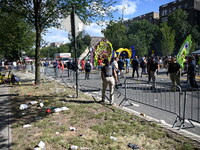 View of the crime scene with evidence markers placed on the ground. The NYPD says in an update that one person is killed and four other peop...